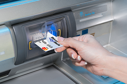 person using ATM